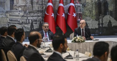 Treasury and Finance Minister Mehmet Şimşek (R) and his Qatari counterpart Ali bin Ahmed Al Kuwari attend the Türkiye-Qatar Joint Economic Commission meeting in Istanbul, Türkiye, Feb. 21, 2025. (AA Photo)