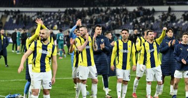 Fenerbahçe players applaud fans after the UEFA Europa League playoff match against Anderlecht at Lotto Park, Brussels, Belgium, Feb. 20, 2025. (AA Photo)