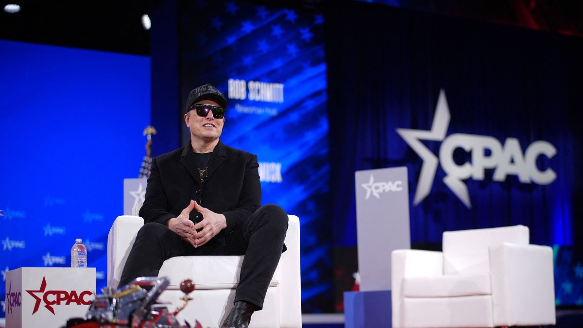 CEO of Tesla and SpaceX Elon Musk sits next to a chainsaw at the Conservative Political Action Conference (CPAC), Oxon Hill, Maryland, U.S., Feb. 20, 2025. (AFP Photo)