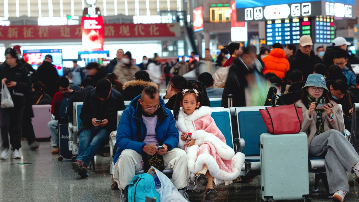 Travelers wait for trains at the Shanghai Hongqiao Railway Station in Shanghai, China, Feb. 4, 2025. (EPA Photo)