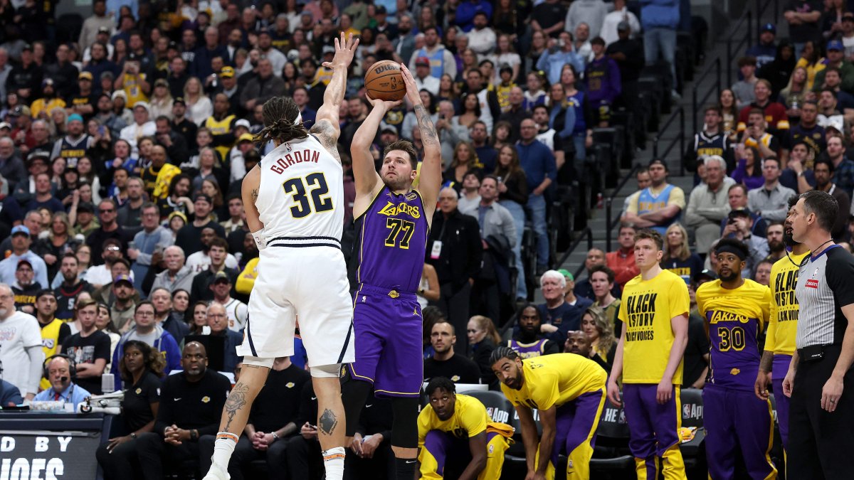 Lakers&#039; Luka Doncic puts up a shot against Nuggets&#039; Aaron Gordon in an NBA game, in Denver, Colorado, U.S., Feb. 22, 2025. (AFP Photo)