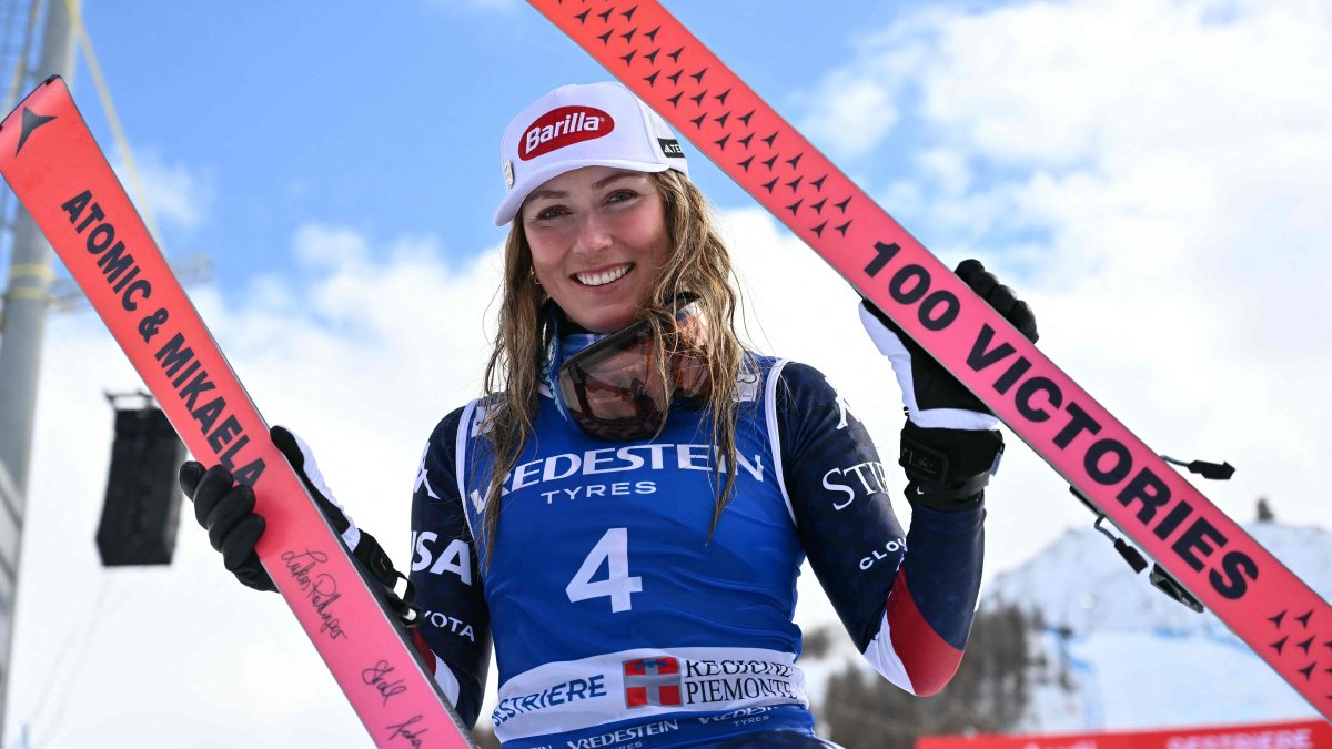U.S.&#039; Mikaela Shiffrin poses with skis marking her &quot;100 Victories&quot; after winning the Women&#039;s Slalom event at the FIS Alpine Skiing World Cup in Sestriere, Italy, Feb. 23, 2025. (AFP Photo)