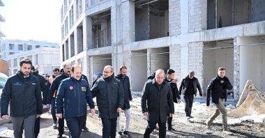AFAD President Ali Hamza Pehlivan (2nd L) and Malatya Governor Seddar Yavuz (3rd L) visit residential projects in Malatya, Türkiye, Feb. 22, 2025. (AA Photo)