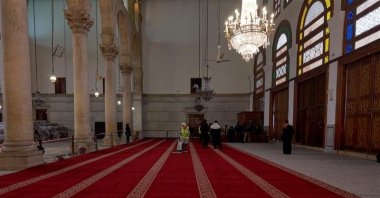The interior of the Umayyad Mosque, showcasing the newly laid burgundy-colored wool carpets, Damascus, Syria,  Feb. 22, 2025. (AA Photo)
