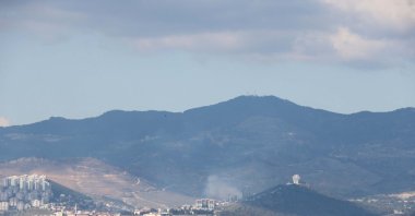 A view of heavy air pollution covering the skyline in Izmir, Türkiye, Feb. 23, 2025. (DHA Photo)