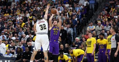 Lakers&#039; Luka Doncic puts up a shot against Nuggets&#039; Aaron Gordon in an NBA game, in Denver, Colorado, U.S., Feb. 22, 2025. (AFP Photo)