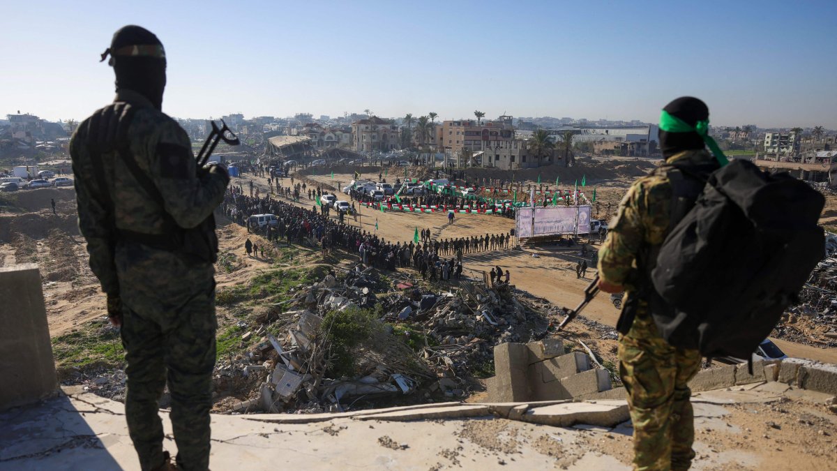 Hamas members keep watch from a building over an area in Khan Younis, southern Gaza Strip, Palestine, Feb. 15, 2025. (AFP Photo)