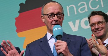 Friedrich Merz, leader of Germany&#039;s conservative Christian Democratic Union (CDU) and his party&#039;s candidate for chancellor, addresses supporters after the first exit polls in the German general elections were announced on TV during the electoral evening in Berlin, Germany, Feb. 23, 2025. (AFP Photo)
