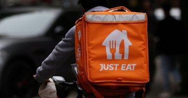 A Just Eat delivery rider cycles through Manchester, U.K., Aug. 23, 2023. (Reuters Photo)