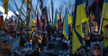 Citizens and families of Ukrainian soldiers killed in the Russia-Ukraine war, take part in a memorial in Lviv, Ukraine, Feb. 23, 2025. (AA Photo)