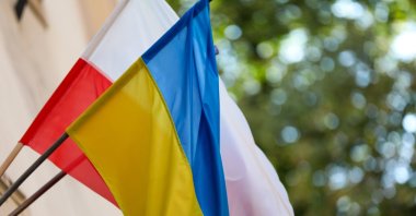 A Ukrainian flag with a Polish flag is seen on a street in Krakow, Poland, Aug. 13, 2024. (Reuters Photo)