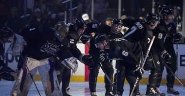 Team Black player singer Justin Bieber high fives teammates during the Skate for LA Strong celebrity hockey game, Los Angeles, U.S., Feb. 23, 2025. (AP Photo)