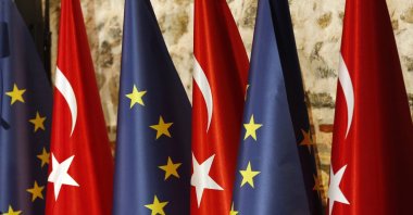 Türkiye's and European Union flags are seen prior to the opening session of a high-level meeting in Istanbul, Türkiye, Feb. 28, 2019. (AP File Photo)