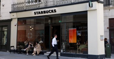 A man walks past a Starbucks cafe in London, Britain, Aug. 13, 2024. (Reuters Photo)