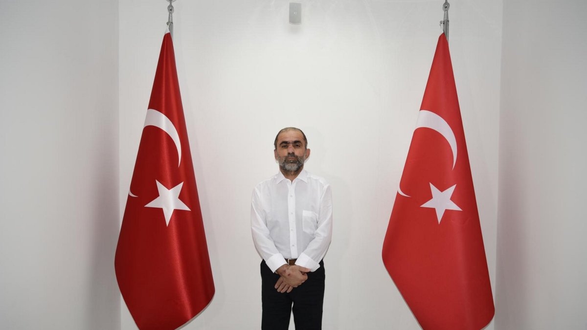 Temir Dükancı is seen at the police headquarters following his arrest, southern Hatay province, Türkiye, Feb. 25, 2025. (AA Photo)