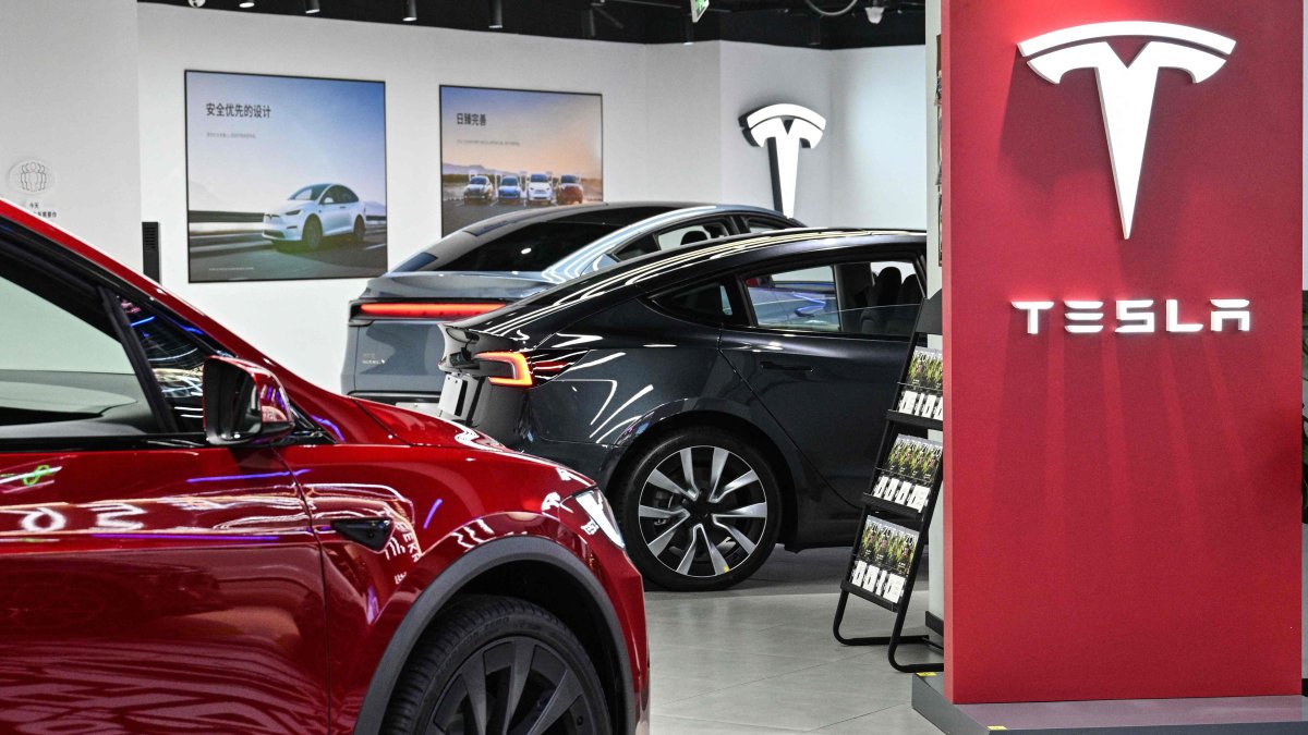Tesla cars are seen in a showroom for the U.S. electric vehicle maker at a mall in the Changning district of Shanghai, China, Feb. 25, 2025. (AFP Photo)