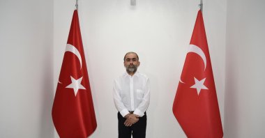 Temir Dükancı is seen at the police headquarters following his arrest, southern Hatay province, Türkiye, Feb. 25, 2025. (AA Photo)