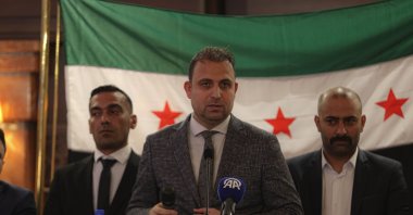 Syrian Turkmen Associations Federation head Tarık Sulo Cevizci (C) speaks at a news conference, Damascus, Syria, Feb. 24, 2025. (AA Photo)