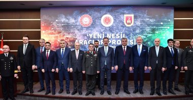 Officials pose during the ceremony to mark the &quot;Next-Generation Vehicles Project&quot; agreement signed with BMC and FNSS at the Presidency of Defense Industries (SSB), Ankara, Türkiye, Feb. 24, 2025. (DHA Photo)