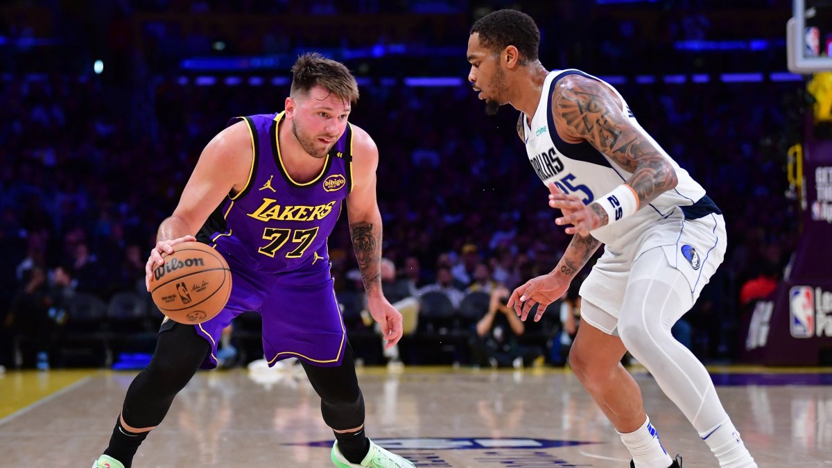 Los Angeles Lakers&#039; Luka Doncic (L) dribbles the ball against Dallas Mavericks&#039; P.J. Washington during the second half at Crypto.com Arena, Los Angeles, U.S., Feb 25, 2025. (Reuters Photo)