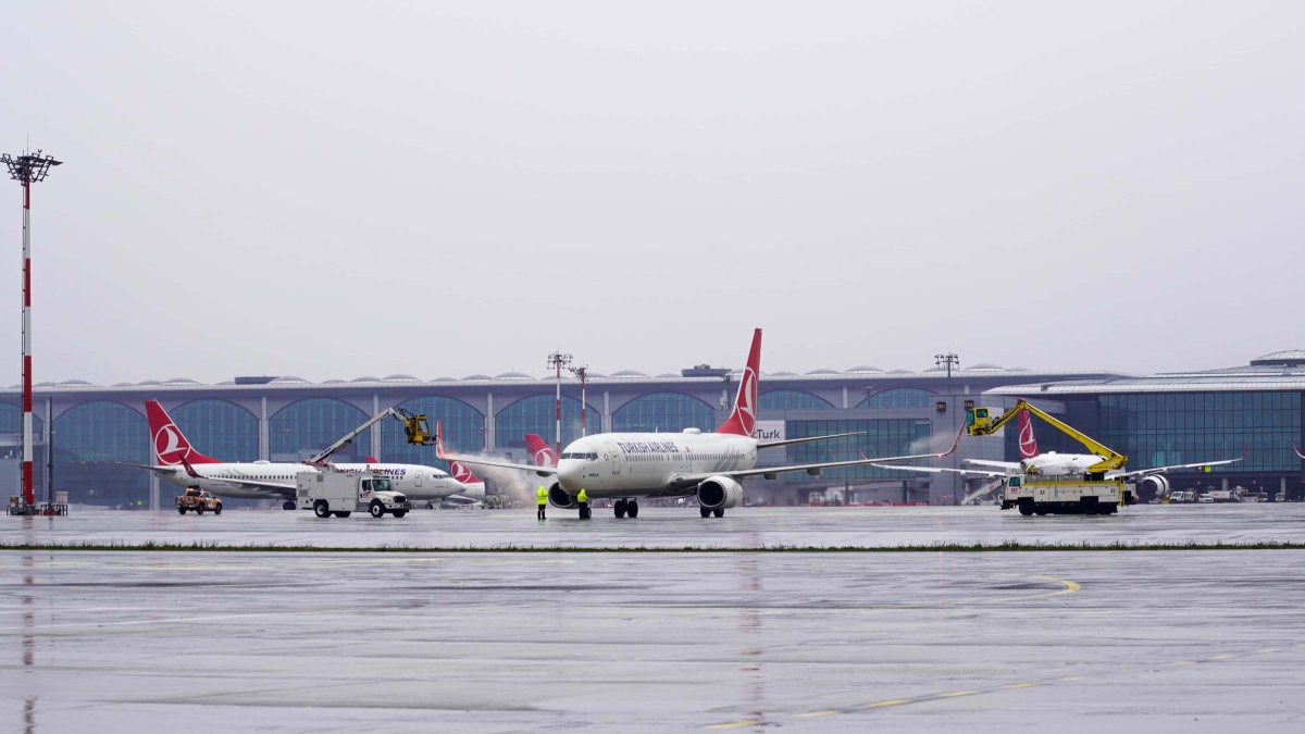 Turkish Airlines aircraft are photographed on the tarmac of Istanbul Airport on a rainy day, Istanbul, Türkiye, Feb. 11, 2025. (DHA Photo)