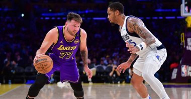 Los Angeles Lakers&#039; Luka Doncic (L) dribbles the ball against Dallas Mavericks&#039; P.J. Washington during the second half at Crypto.com Arena, Los Angeles, U.S., Feb 25, 2025. (Reuters Photo)