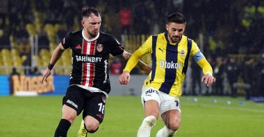 Fenerbahçe's Dusan Tadic (R) in action with Gaziantep FK's Deian Sorescu at the Ülker Stadium, Istanbul, Türkiye, Dec. 2, 2025. (IHA Photo)