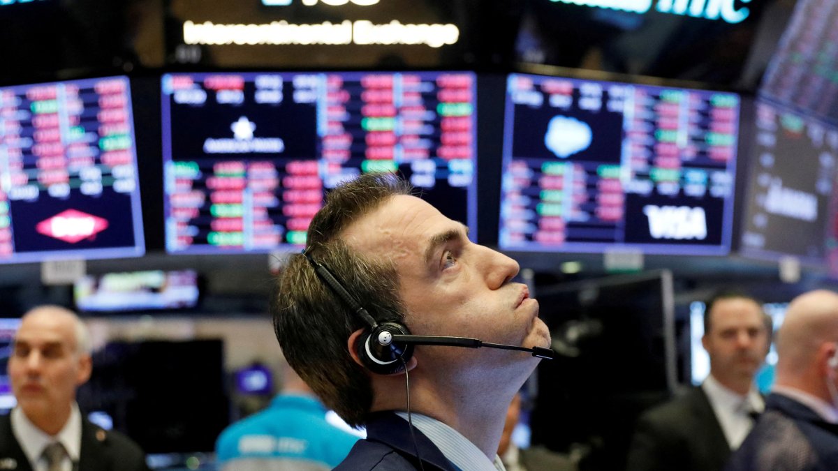 A trader works on the floor of the New York Stock Exchange shortly before the closing bell as the market takes a significant dip, New York, U.S., Feb. 25, 2020. (Reuters Photo)