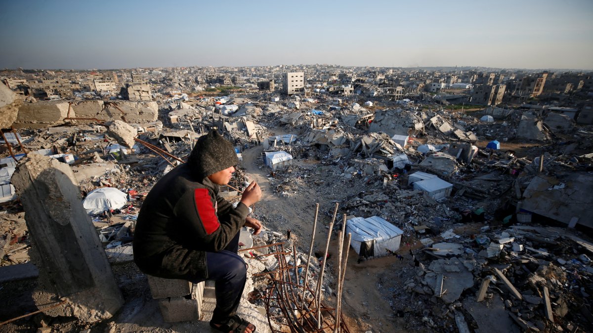 A Palestinian looks at the rubble of destroyed buildings in the Jabalia refugee camp, northern Gaza Strip, Palestine, Feb. 26, 2025. (Reuters Photo)