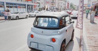 A Citroen Ami mini electric car is parked on the city street, Antalya, southern Türkiye, May 19, 2022. (Shutterstock Photo)