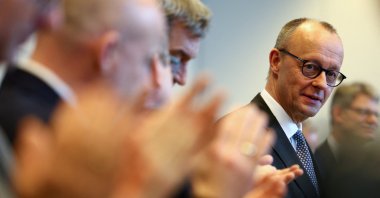 Christian Democratic Union (CDU) leader Friedrich Merz looks on as he is greeted with applause by the CDU and Christian Social Union (CSU) members before the start of their parliamentary fraction meeting following the German general elections, Berlin, Germany, Feb. 25, 2025. (Reuters Photo)