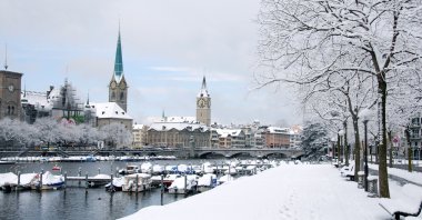 Zurich transforms into a magical haven during winter, where the charm of snow-covered streets blends seamlessly with the warmth of inviting cafes and cultural landmarks. (Shutterstock Photo)
