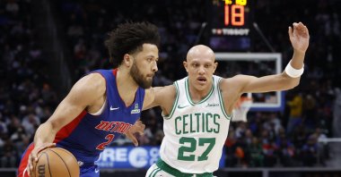 Detroit Pistons&#039; Cade Cunningham (L) dribbles defended by Boston Celtics&#039; Jordan Walsh in the second half at Little Caesars Arena, Detroit, U.S., Feb. 26, 2025. (Reuters Photo)