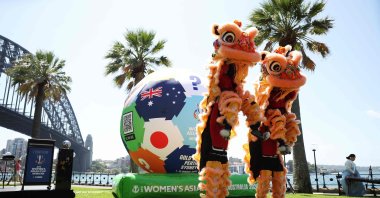 A pair of Chinese dragons entertain during an AFC Women&#039;s Asian Cup Australia 2026 One Year To Go Announcement at Hickson Road Reserve, Sydney, Australia, Feb. 27, 2025. (AFP Photo)