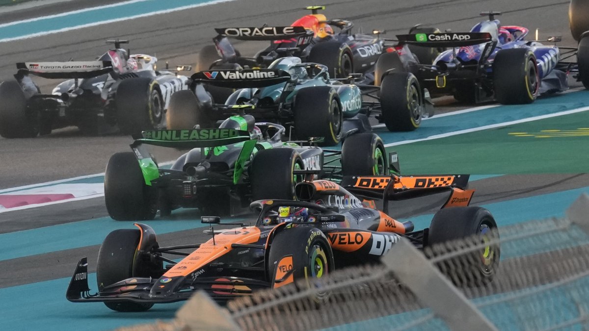 McLaren driver Oscar Piastri of Australia spins after contact with Red Bull driver Max Verstappen of the Netherlands in the first corner during the Formula One Abu Dhabi Grand Prix at the Yas Marina Circuit, Abu Dhabi, UAE, Dec. 8, 2024. (AP Photo)