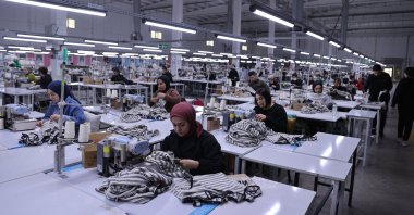 Workers are seen at a textile factory at an organized industrial zone, Mardin province, southeastern Türkiye, Feb. 13, 2025. (AA Photo)