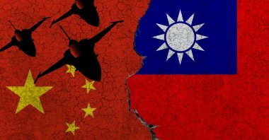 The illustration shows the Chinese and Taiwanese flags on an old wall and military aircraft silhouettes in the background. (Shutterstock Photo)