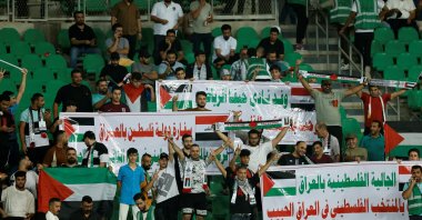 Palestine fans wait inside the stadium before the World Cup Asian qualifiers third-round Group B match against Iraq at the Basra International Stadium, Basra, Iraq, Oct. 10, 2024. (Reuters Photo)