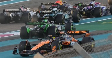 McLaren driver Oscar Piastri of Australia spins after contact with Red Bull driver Max Verstappen of the Netherlands in the first corner during the Formula One Abu Dhabi Grand Prix at the Yas Marina Circuit, Abu Dhabi, UAE, Dec. 8, 2024. (AP Photo)