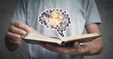 The book "Artificial Intelligence and Society" discusses the profound opportunities AI presents while also highlighting the challenges it brings. (Shutterstock Photo)