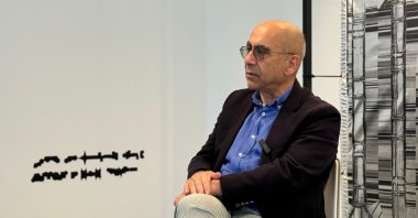 Director and screenwriter Derviş Zaim participates in a lecture at YUNT center in Sultanbeyli, Istanbul, Türkiye, March 2, 2025. (AA Photo)