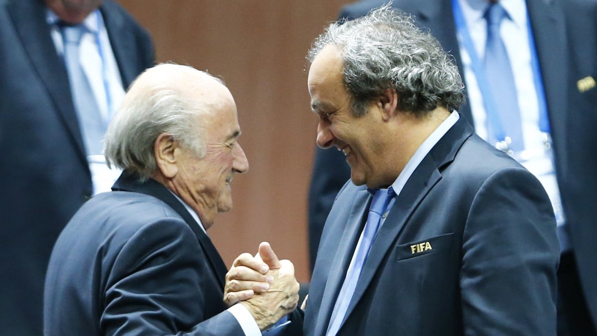 Former UEFA President Michel Platini (R) congratulates former FIFA President Sepp Blatter after he was re-elected at the 65th FIFA Congress, Zurich, Switzerland, May 29, 2015. (Reuters Photo)