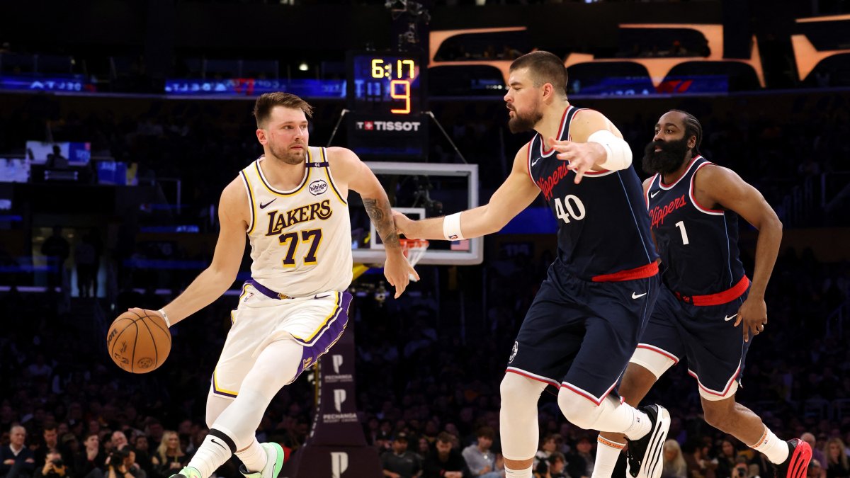 Los Angeles Lakers&#039; Luka Doncic (L) dribbles against LA Clippers center Ivica Zubac (C) and guard James Harden during the second quarter at Crypto.com Arena, Los Angeles, U.S., March 2, 2025. (Reuters Photo)