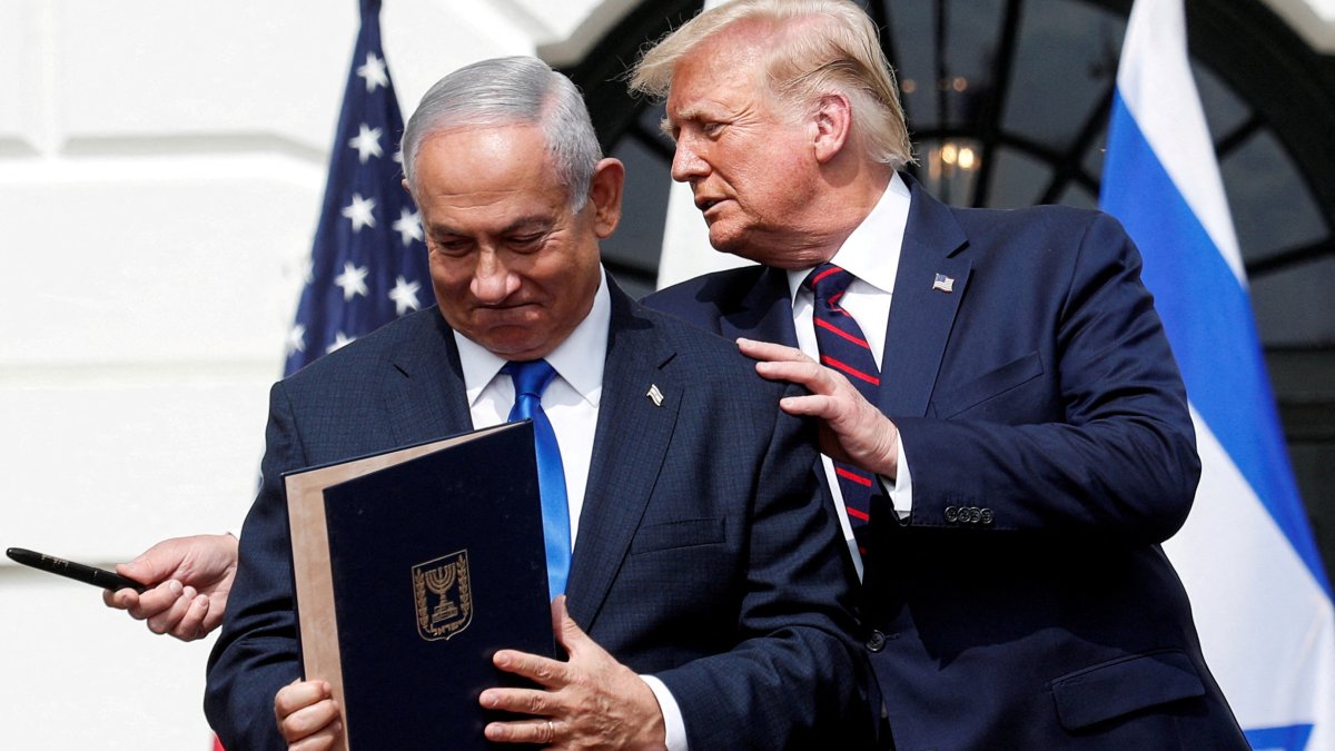 Israel's Prime Minister Benjamin Netanyahu stands with U.S. President Donald Trump after signing the Abraham Accords, Washington, U.S., Sept. 15, 2020. (Reuters Photo)
