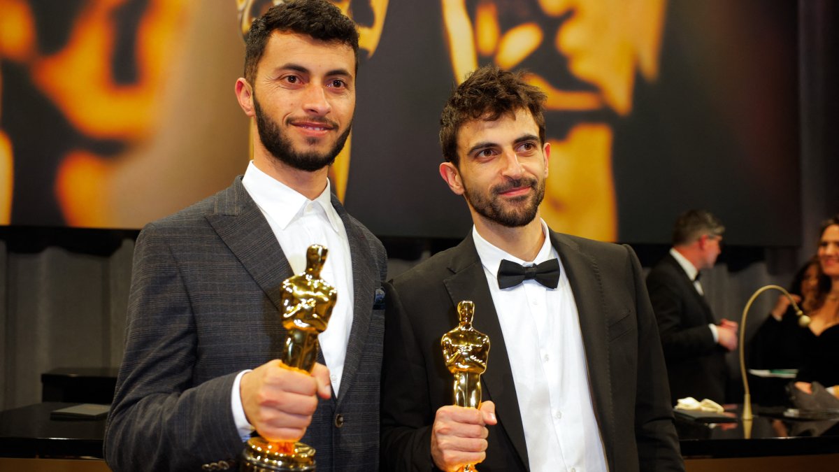 Basel Adra and Yuval Abraham pose with the Oscar for Best Documentary Feature Film for &quot;No Other Land&quot; at the 97th Academy Awards in Hollywood, Los Angeles, California, U.S., March 2, 2025. (Reuters Photo)