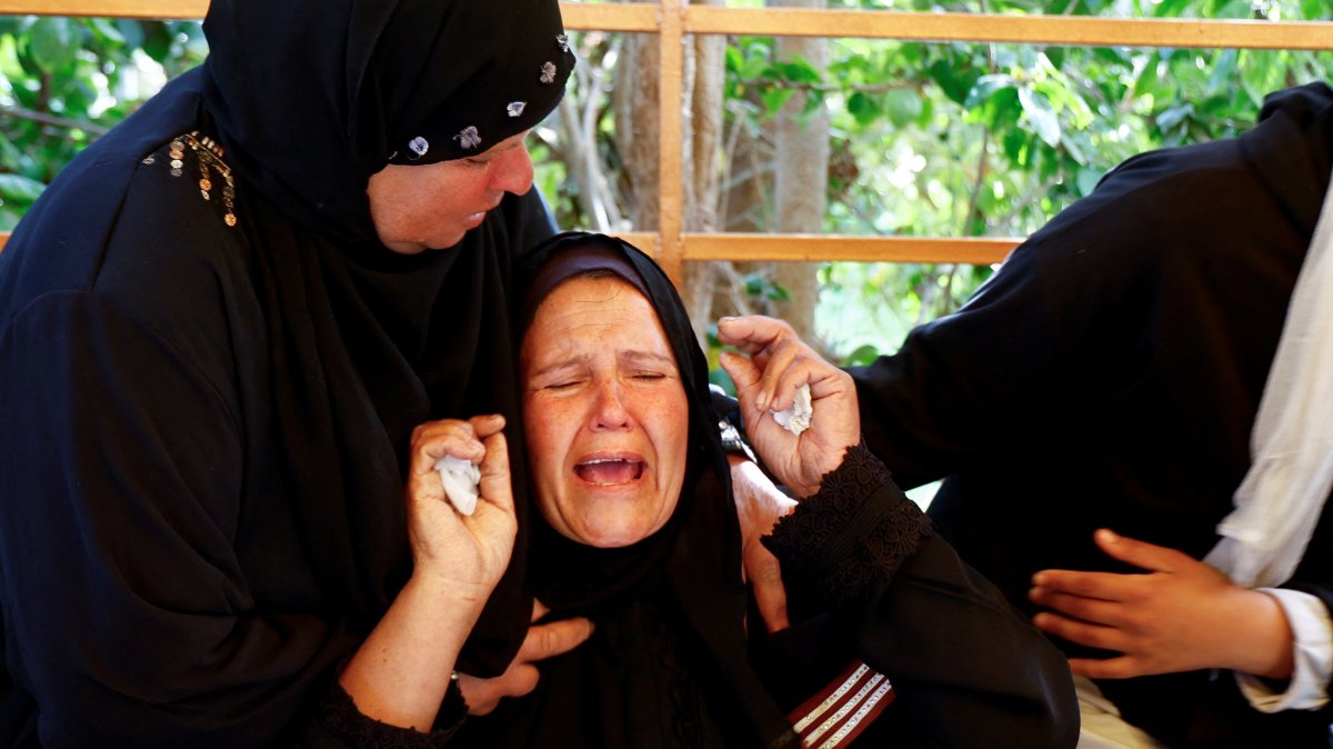 Mourners react during the funeral of two Palestinians killed by Israeli fire in Khan Younis, southern Gaza Strip, Palestine, March 3, 2025. (Reuters Photo)