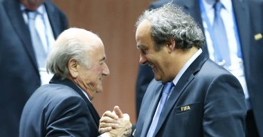 Former UEFA President Michel Platini (R) congratulates former FIFA President Sepp Blatter after he was re-elected at the 65th FIFA Congress, Zurich, Switzerland, May 29, 2015. (Reuters Photo)