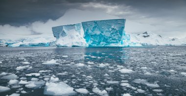 A massive blue iceberg drifts in the sea off the coast of Antarctica, Nov. 5, 2019. (Getty Images Photo)