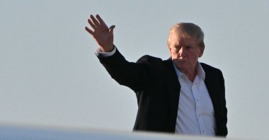 U.S. President Donald Trump boards Air Force One at Palm Beach International Airport as he returns to Washington, DC., West Palm Beach, Florida, March 2, 2025. (AFP Photo)