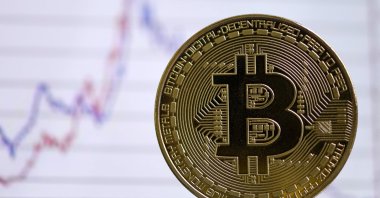 The photo shows a physical imitation of a bitcoin in Dortmund, western Germany, Jan. 27, 2020. (AFP Photo)